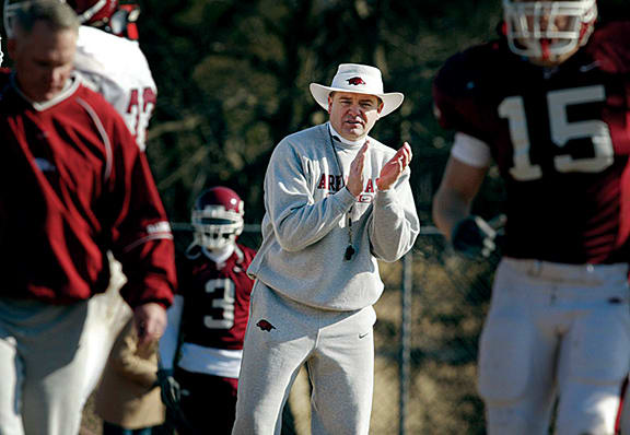 Arkansas head coach Houston Nutt gets his team motivated during practice at Brentwood Academy on Dec. 27, 2002, as they prepare for the Music City Bowl. Houston Nutt Music City Bowl.